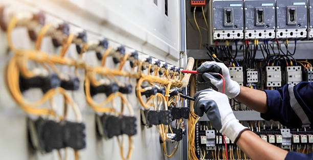 Professional Electrician technician working in Merriam, KS